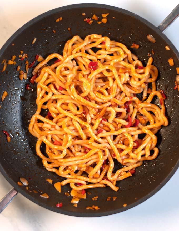 Instant noodles are tossed in the Thai Seasoning Sauce.