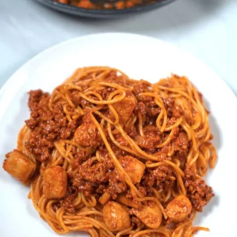 A serving of Filipino Pasta on a white plate.