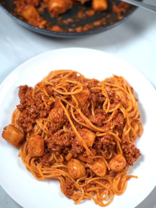 A serving of Filipino Pasta on a white plate.