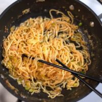 Chopstick with a serving of Hibachi Noodles.