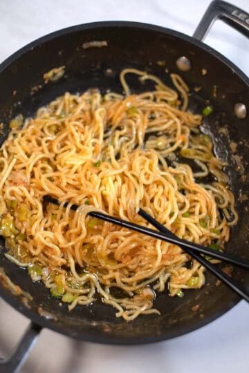 Chopstick with a serving of Hibachi Noodles.