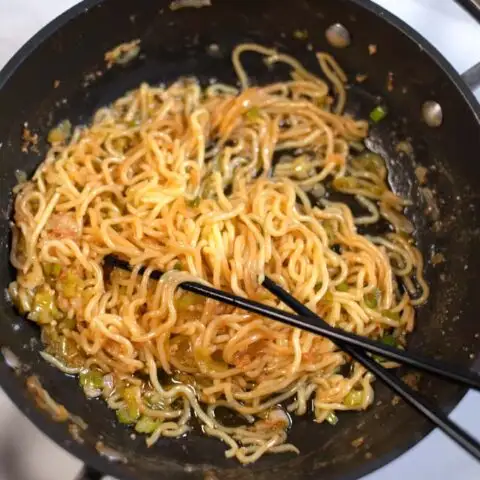 Chopstick with a serving of Hibachi Noodles.