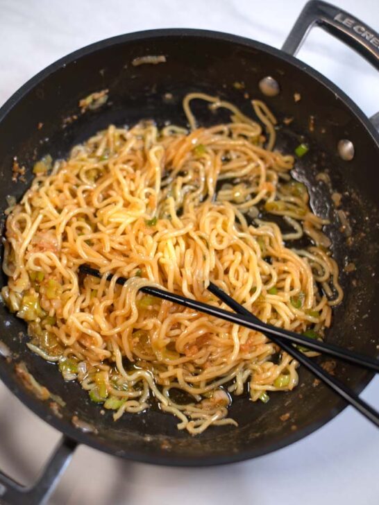 Chopstick with a serving of Hibachi Noodles.