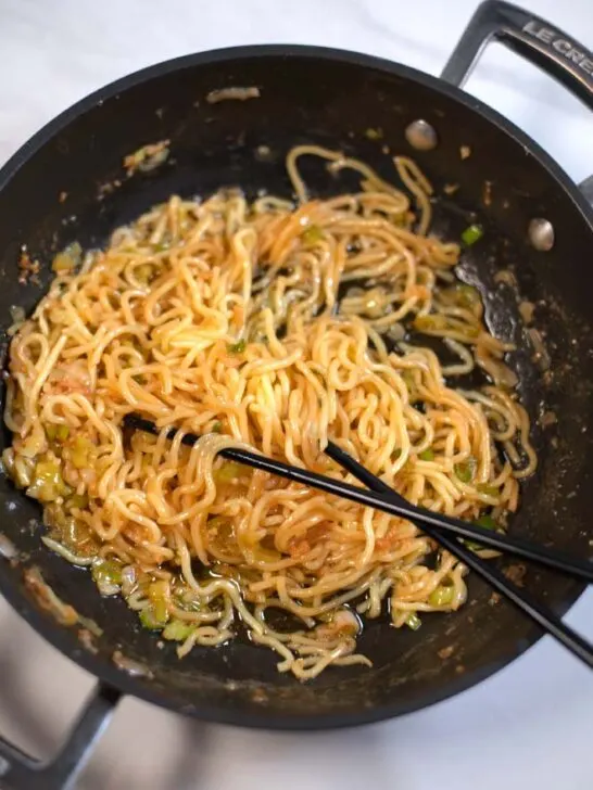 Chopstick with a serving of Hibachi Noodles.