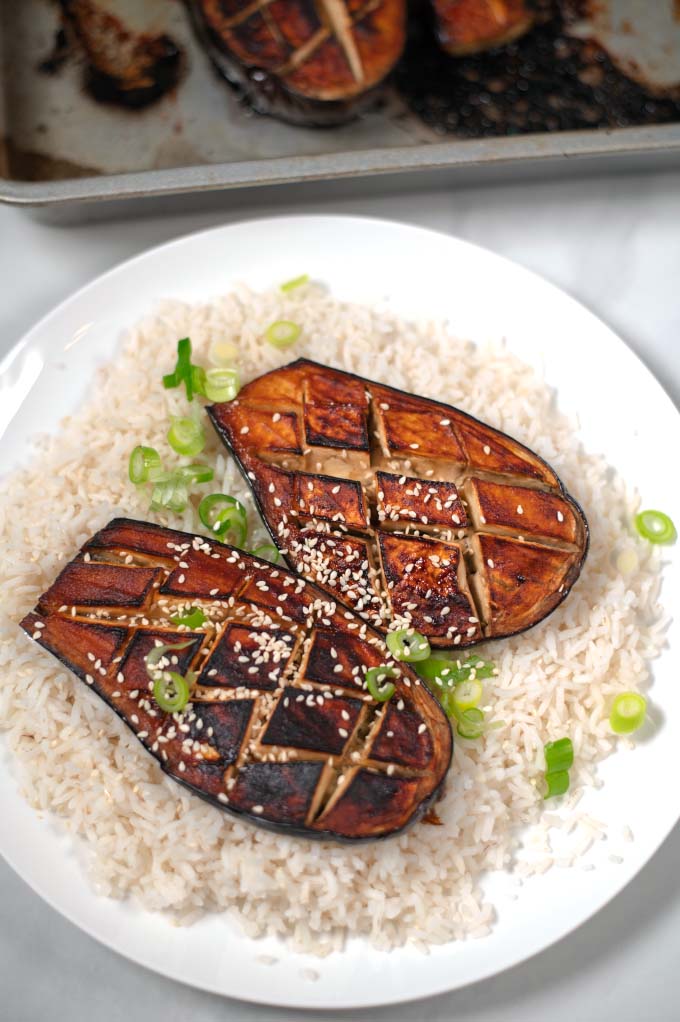 Miso Eggplant garnished with fresh scallions and sesame seeds.