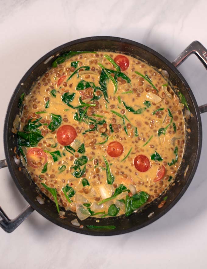 The Curry cooked in a sauce pan.