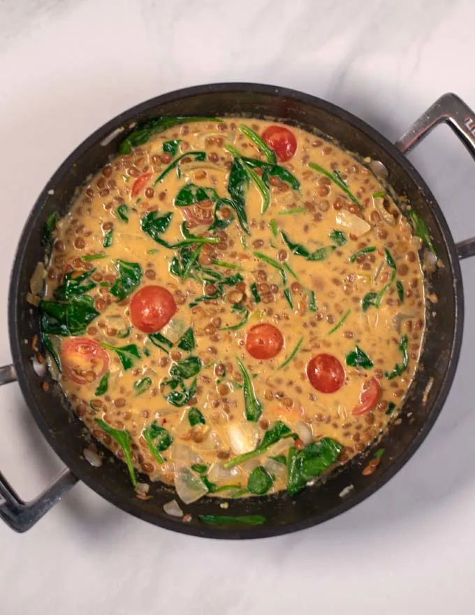 The Curry cooked in a sauce pan.