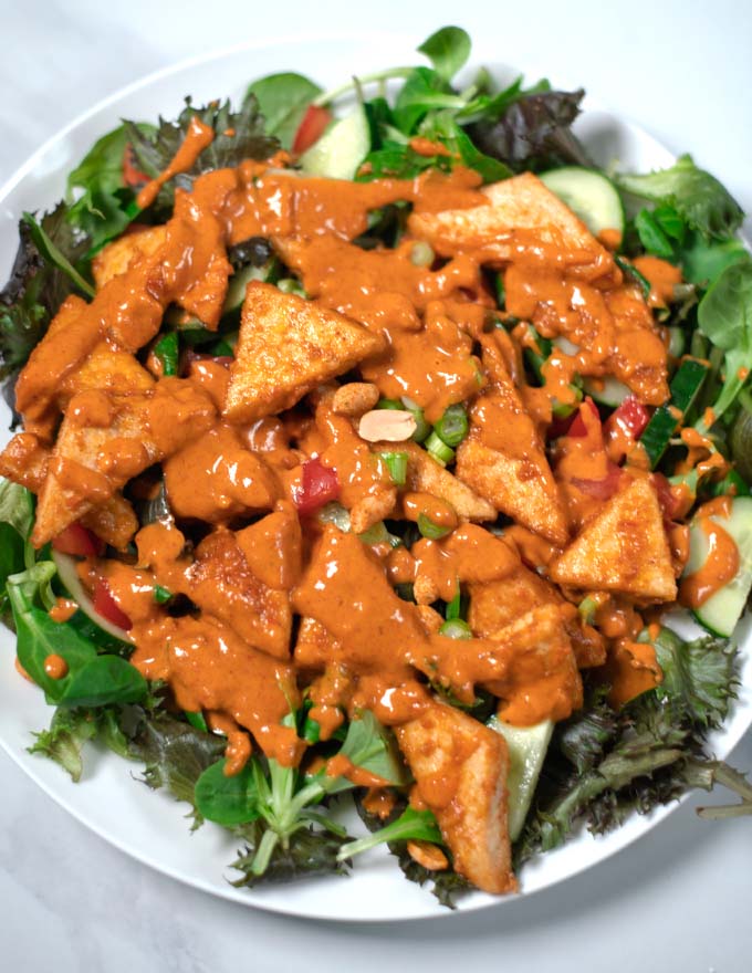 Fresh scallions and extra peanuts are used for the Cripsy Tofu Salad.