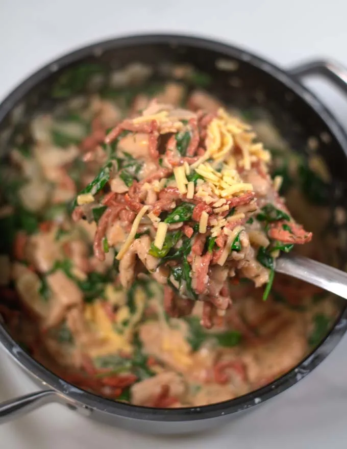 A large ladle with Crack Chicken Soup.