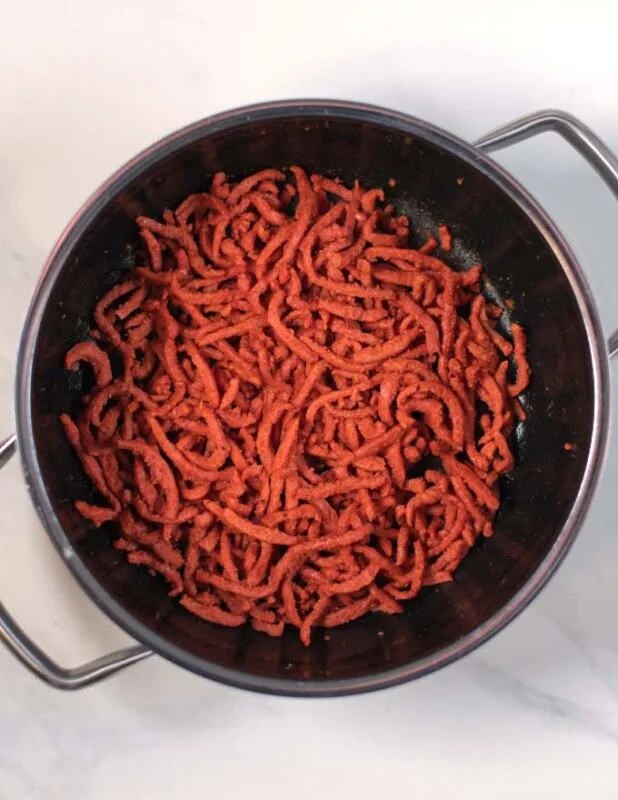 Vegan bacon strips are prefried.