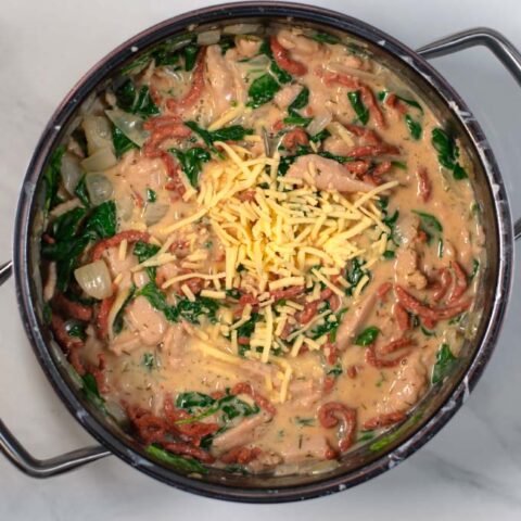 Grated cheese is used as topping for Crack Chicken Soup