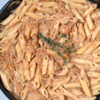 Closeup of a pan with French Onion Pasta.