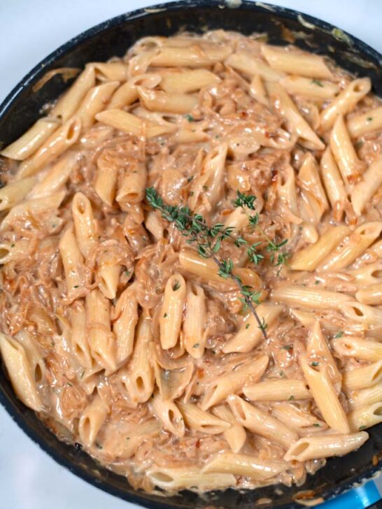 Closeup of a pan with French Onion Pasta.