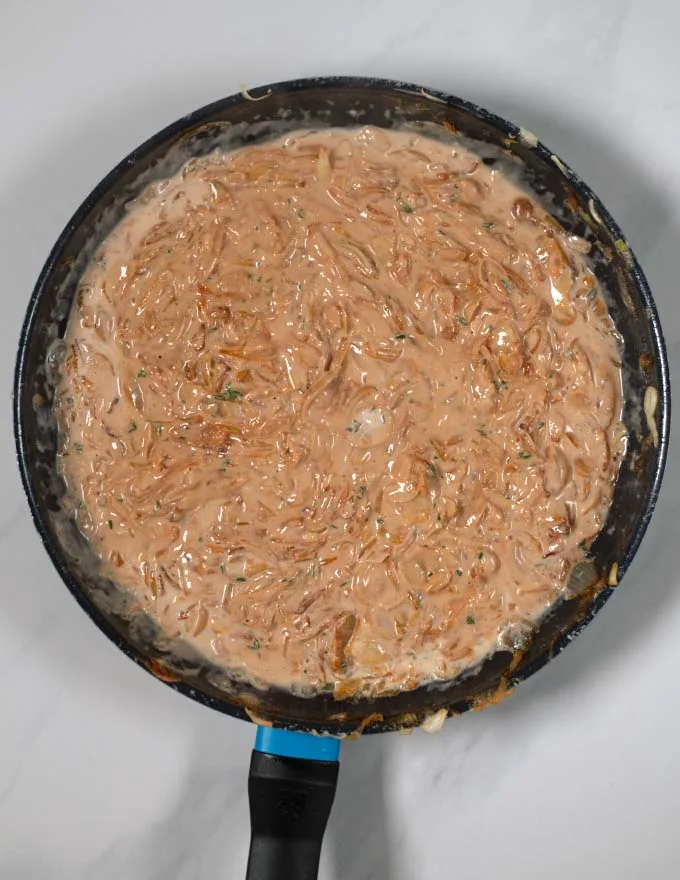 Creamy French Onion sauce in a pan.