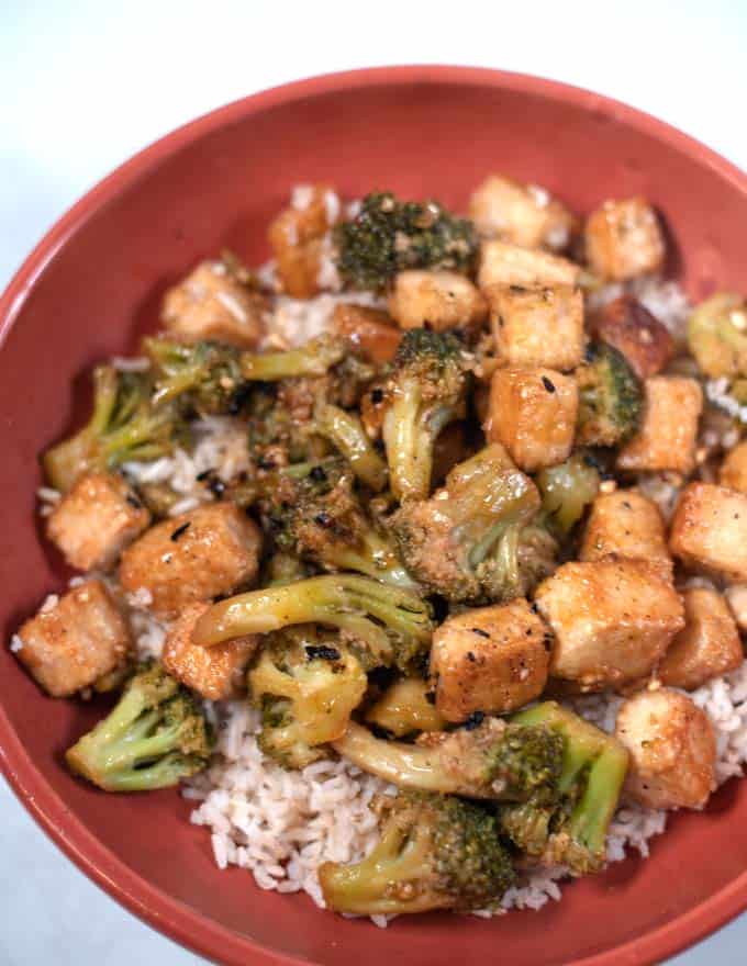 Closeup of a serving of Tofu and Broccoli over rice.