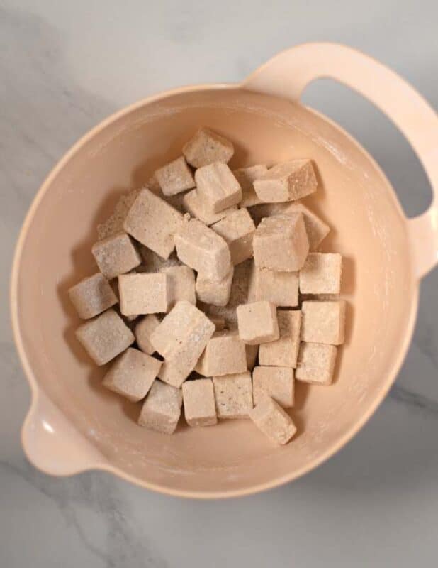 Cornstrach coated tofu cubes.