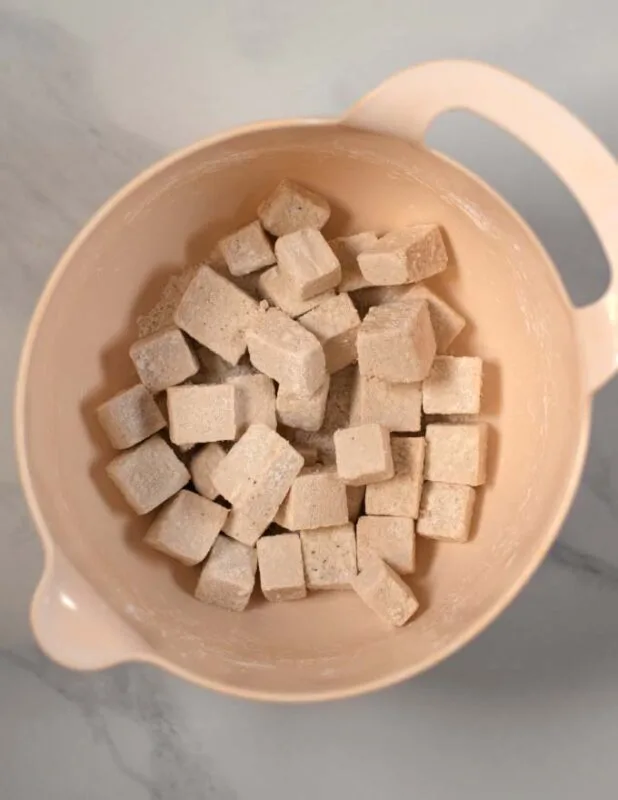 Cornstrach coated tofu cubes.