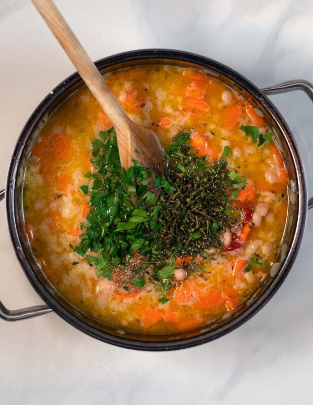 Lots of fresh chopped parseley is mixed in the Fasolada.