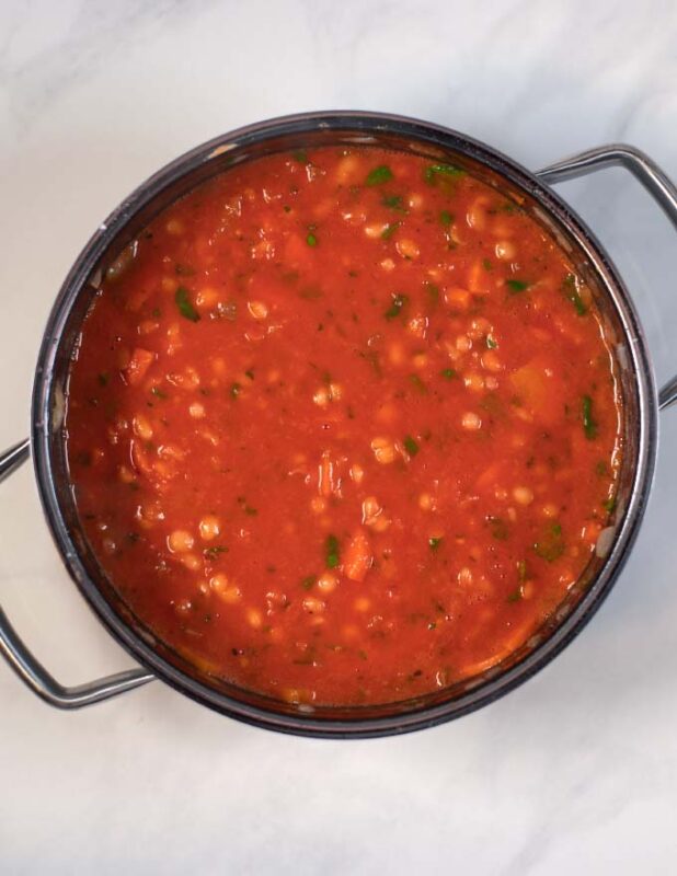 Tomato paste gives Fasolada its red color.