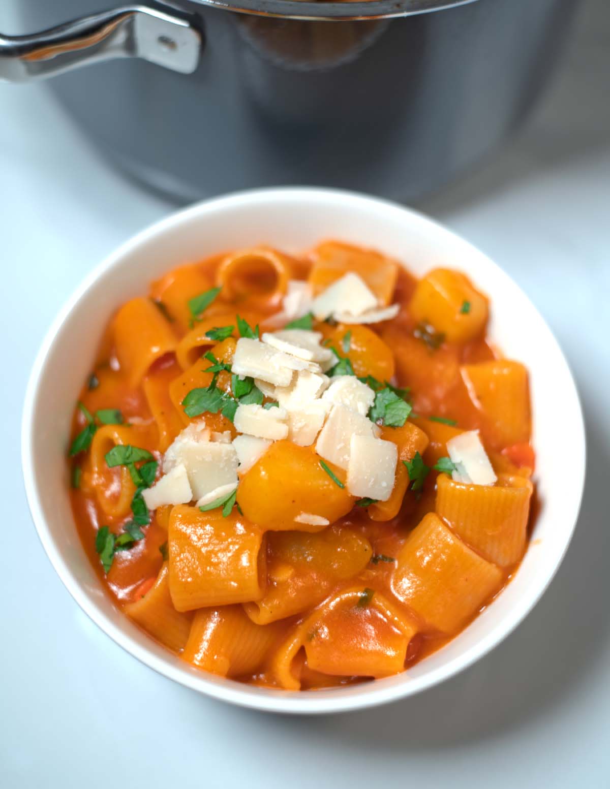 Pasta e Patate is garnished with extra vegan parmesan.