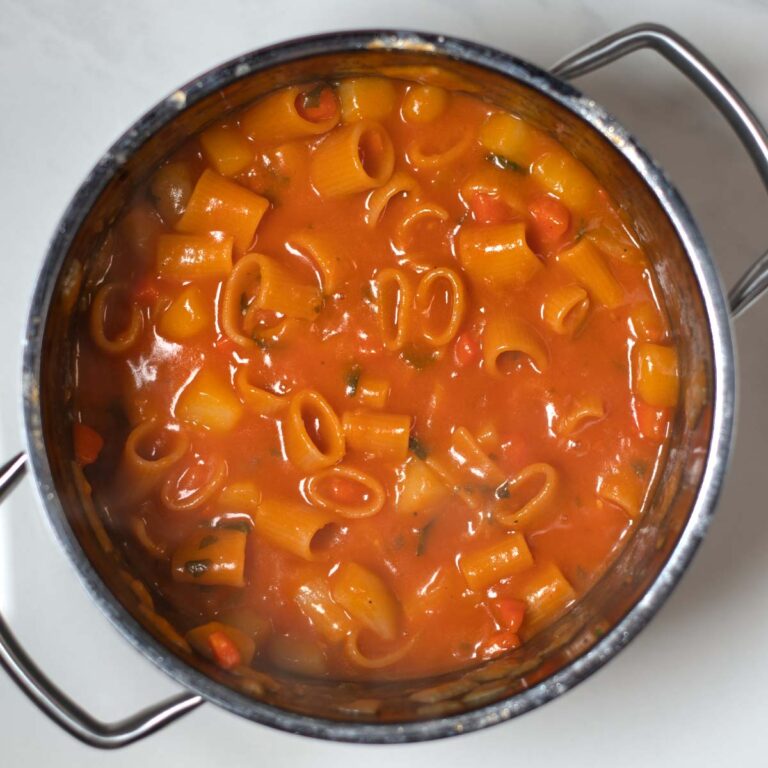 Pasta e Patate are cooked in the a pot.