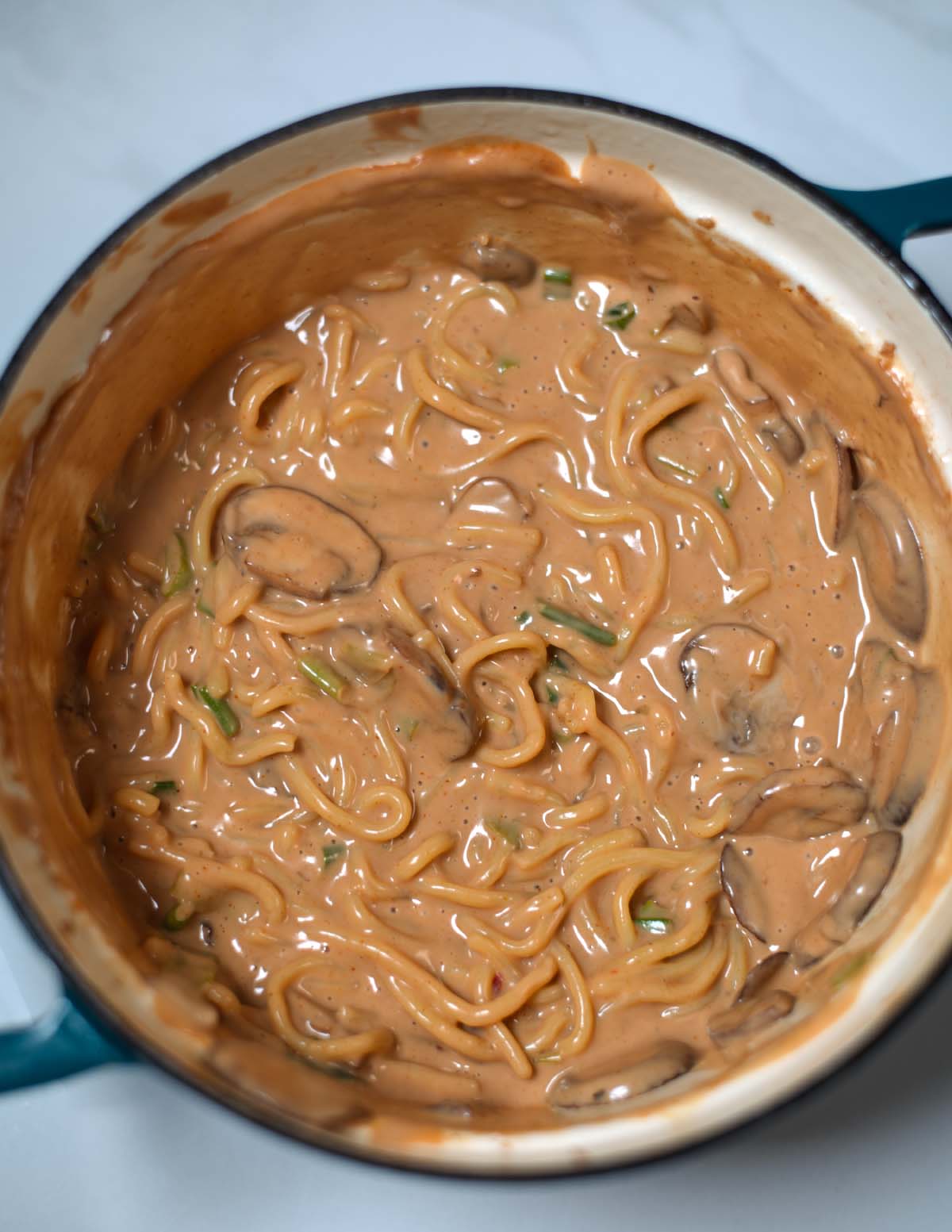 Ready Peanut Butter Ramen in the Dutch oven.