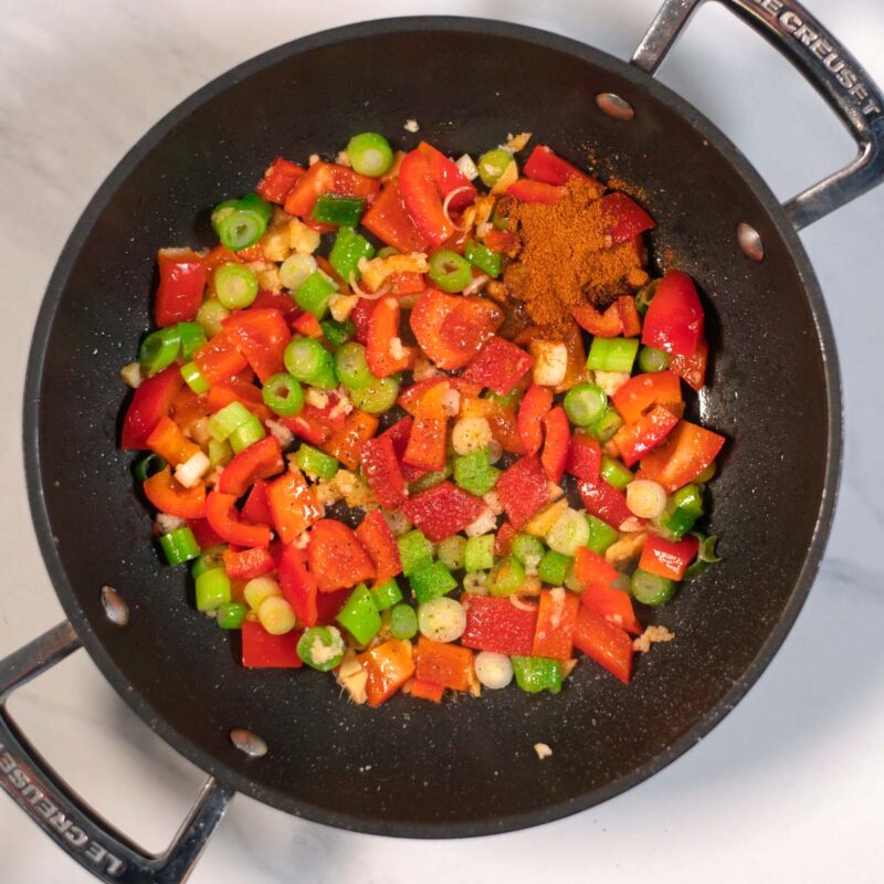 Vegetables and spices for Sweet and Sour Tofu in a pan.