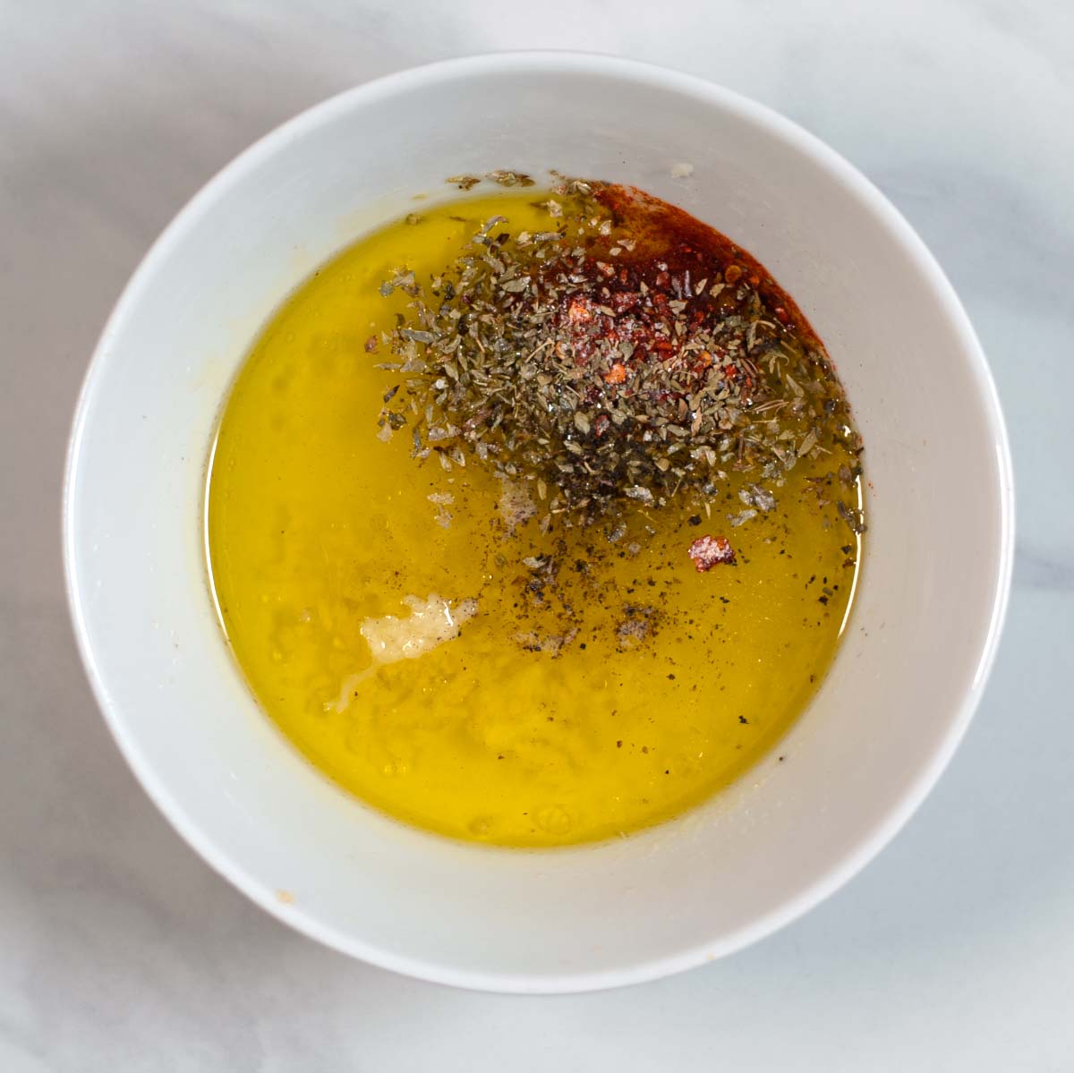 Ingredients for the dressing are in a small mixing bowl.