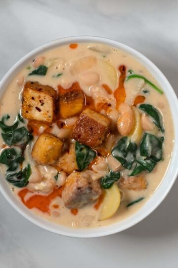 A serving of Million Dollar Soup in a white bowl.