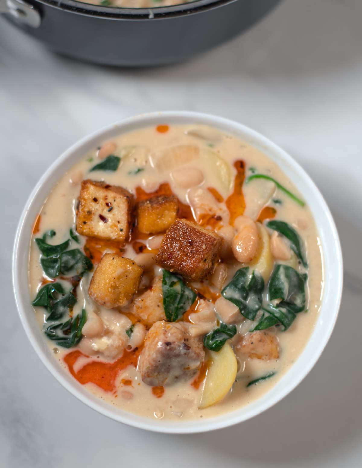 A serving of Million Dollar Soup in a white bowl.