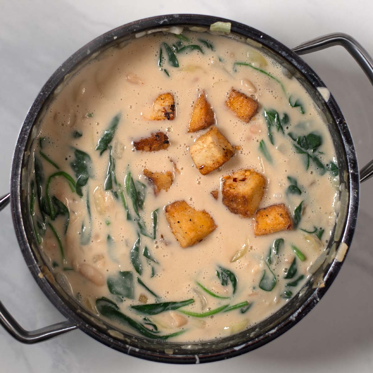 Crunchy Tofu cubes are added to the Million Dollar Soup.