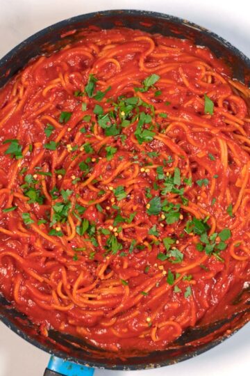 Finally, another topping of chili flakes adds even more punch to the Spaghetti All'Assassina.