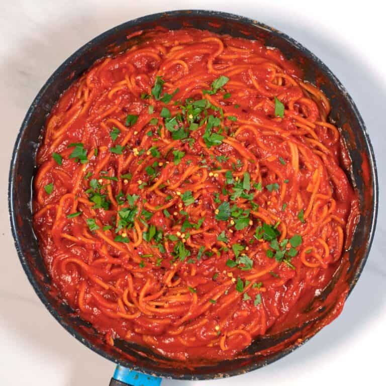 Finally, another topping of chili flakes adds even more punch to the Spaghetti All'Assassina.