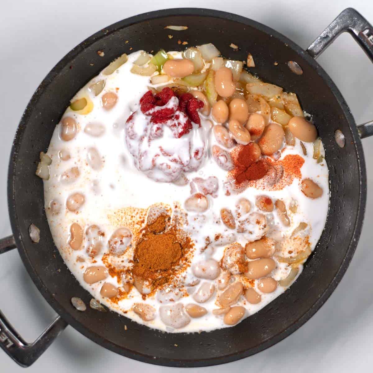 Creamy Tikka Masala Beans with spices and yogurt, perfect for an easy, flavorful dinner.