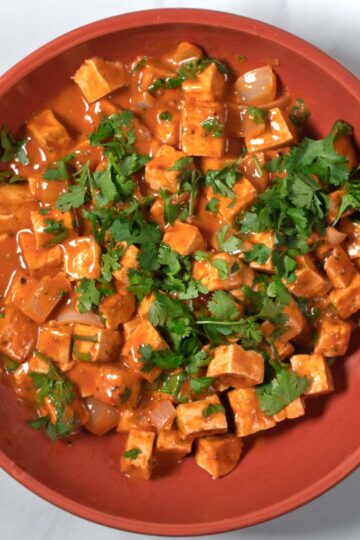 Easy Tofu Tikka Masala is served in a large bowl.