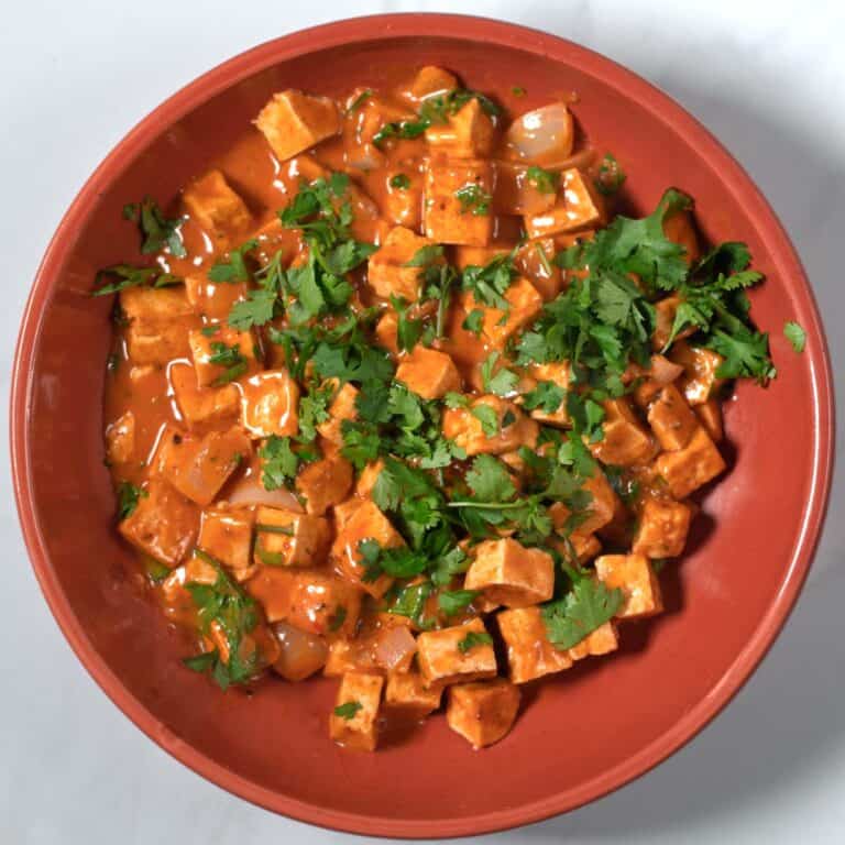 Easy Tofu Tikka Masala is served in a large bowl.