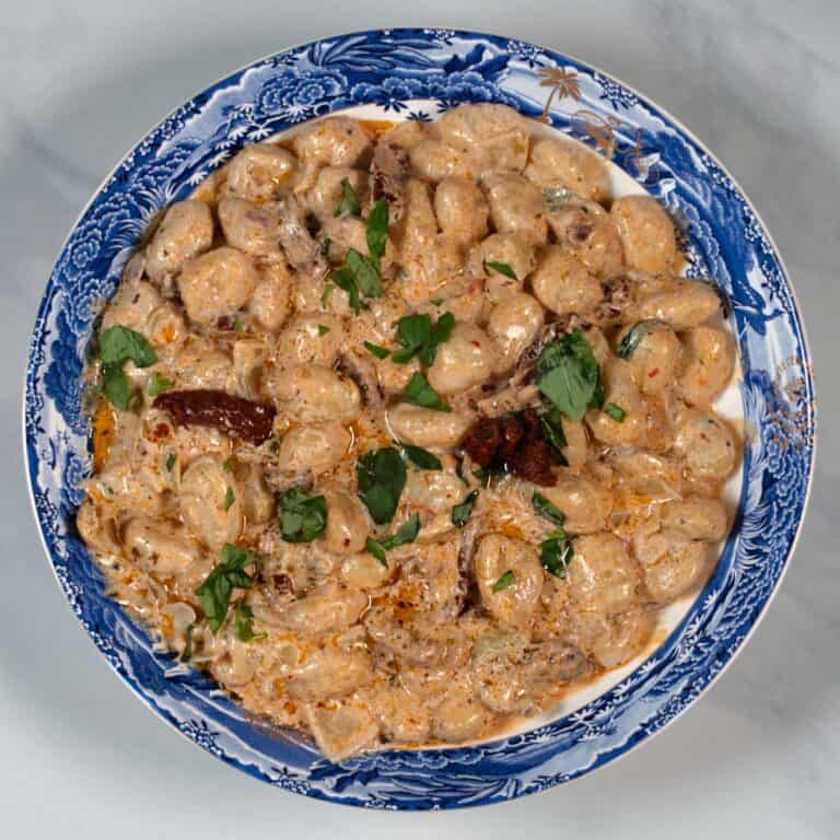 A serving of Marry Me Gnocchi on a large plate.