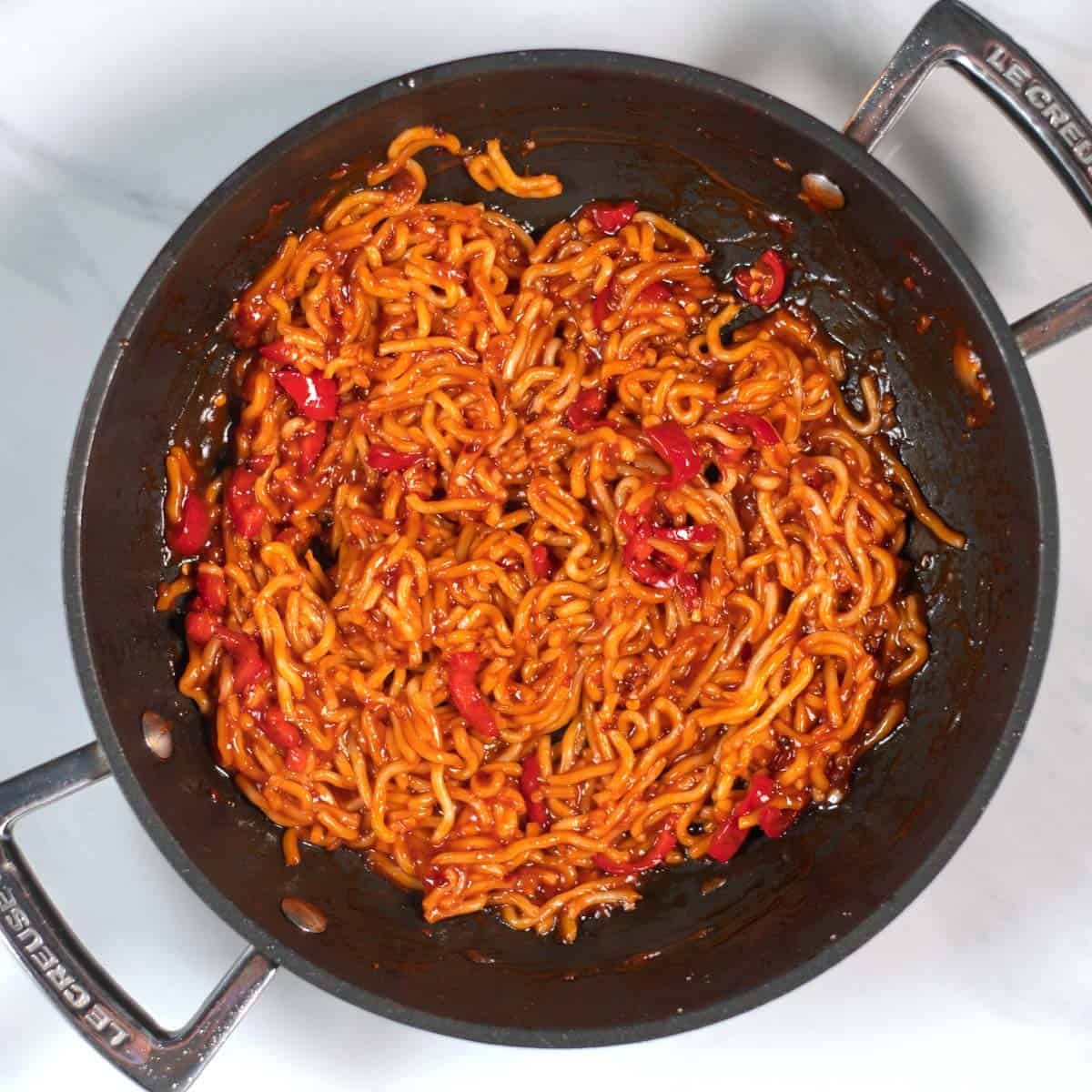 Top view of a pan with Chili Noodles.