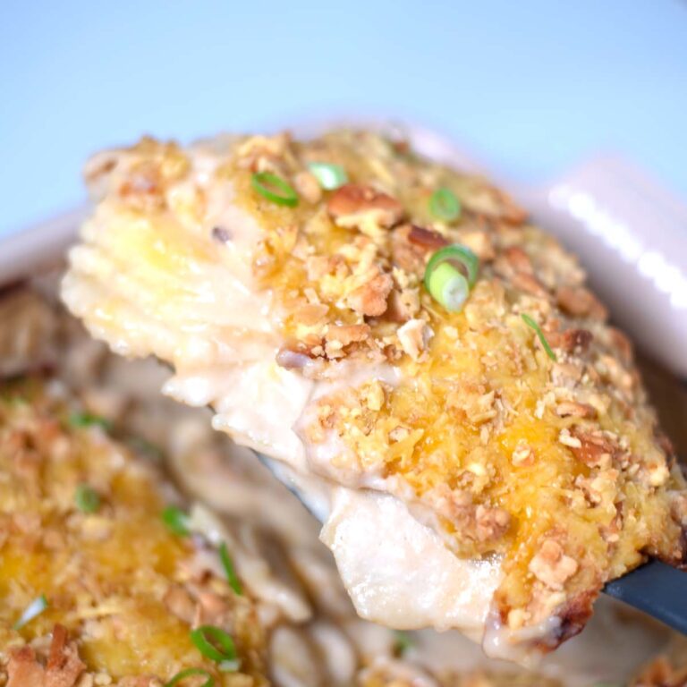 Showing the layers and creamy sauce of this baked potato casserole.