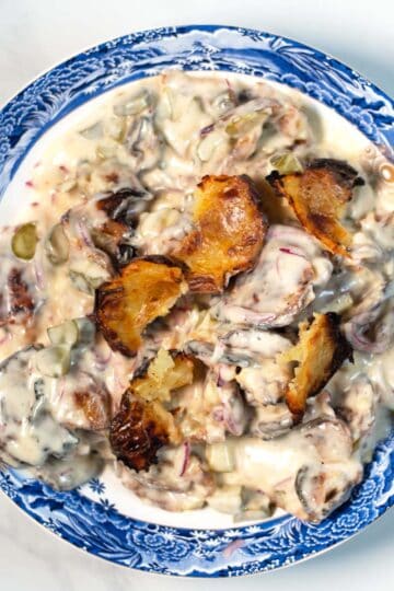 Smashed Potato Salad in a large serving bowl.