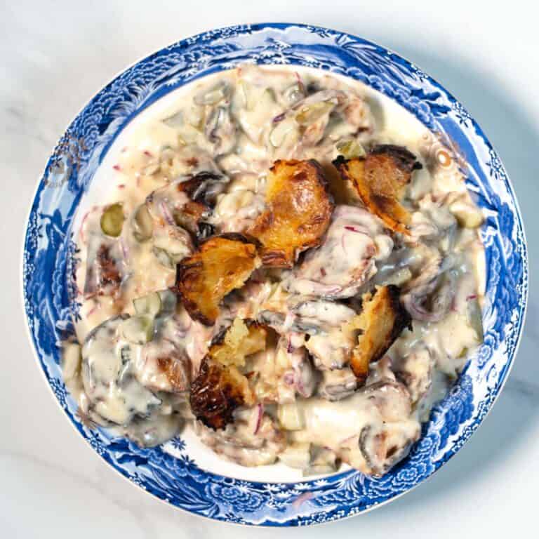 Smashed Potato Salad in a large serving bowl.