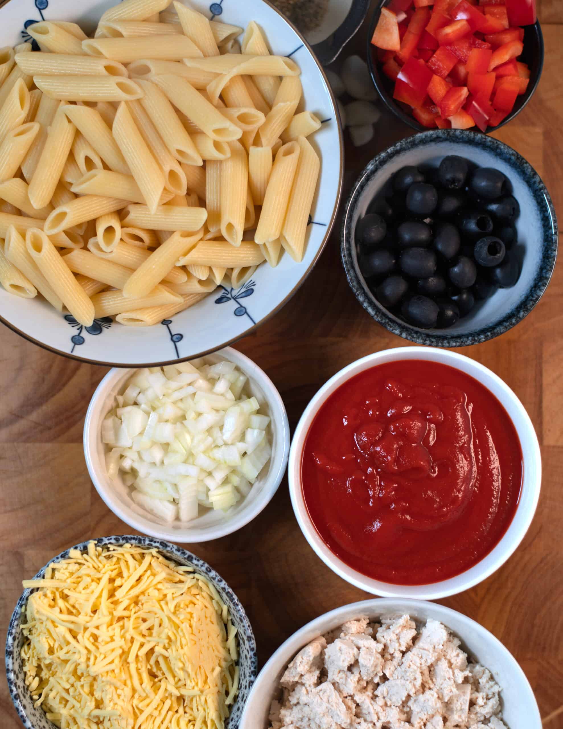 Ingredients needed to make Tofu Pasta Casserole collected before preparation.