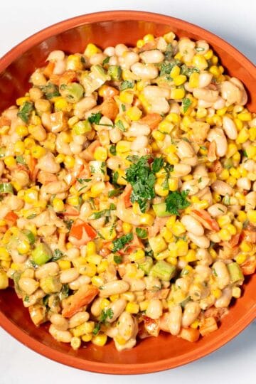 A plate full of White Bean Salad.