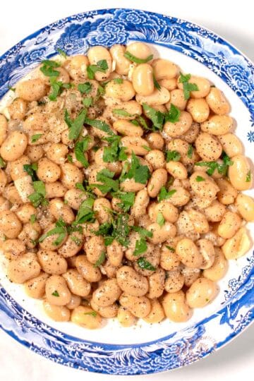 A serving of Cacio e Pepe Beans on a plate.