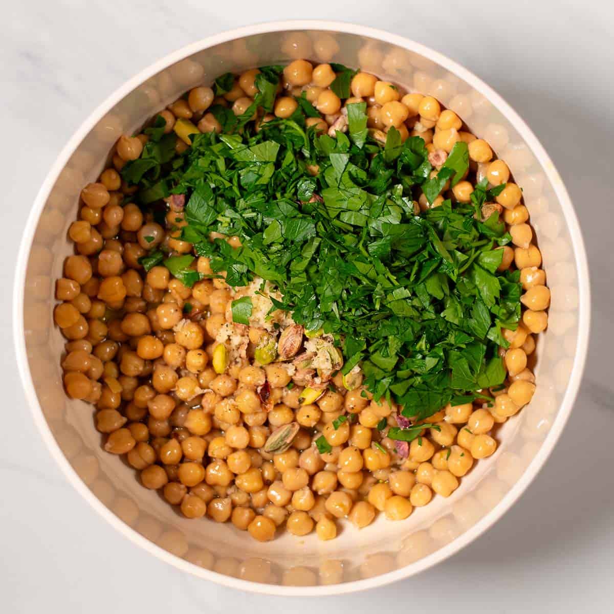 Mixing bowl with ingredients for the Lemon Chickpeas.