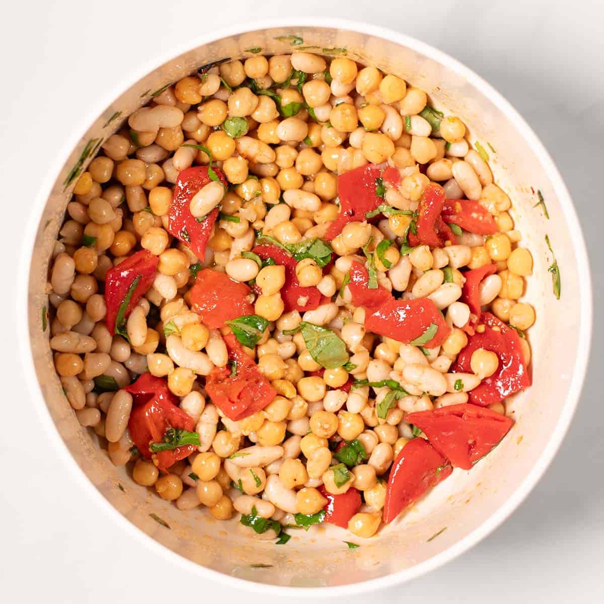 Grinder Salad ingredients mixed in a bowl.