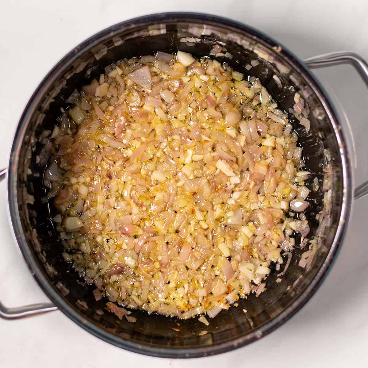 Shallots and garlic and roasted in olive oil.