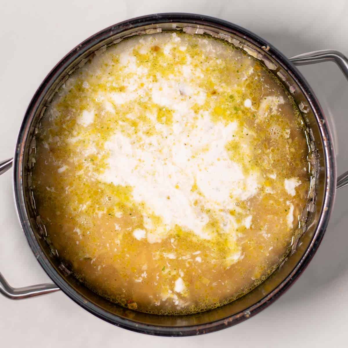 Vegetable broth and coconut milk are used in toasted orzo.