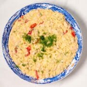 A large serving bowl with Creamy Lemon Orzotto.