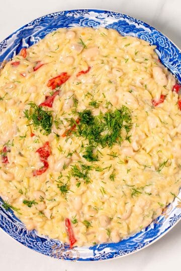 A large serving bowl with Creamy Lemon Orzotto.